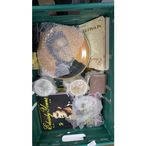 2030 - A crate of Elvis Presley collectibles including an ink wash set, prints, magazines, a watch in tin, ... 