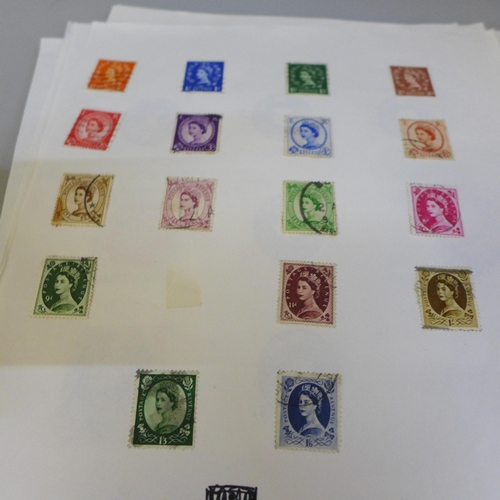 690 - A large quantity of stamps, loose and in albums