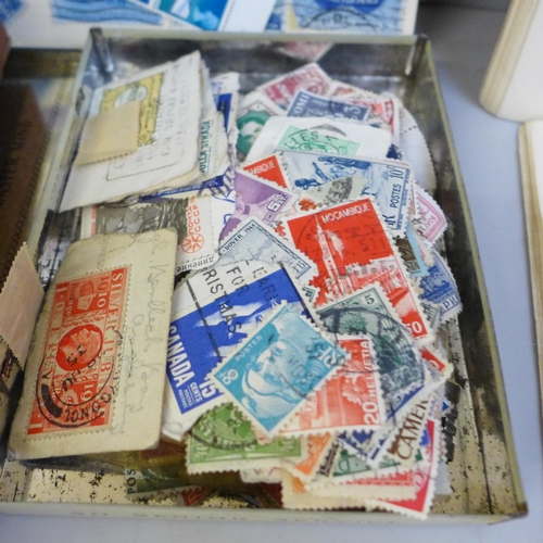 690 - A large quantity of stamps, loose and in albums