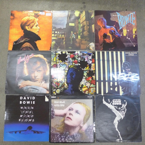 692 - A collection of 12 David Bowie and Rolling Stones LP records and 12