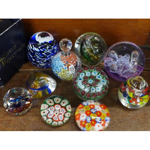 704 - Thirteen glass paperweights including Caithness and Millefiori