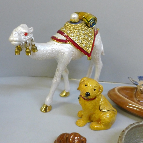 715 - A quantity of Wade pin trays, etc., and two enamelled novelty boxes, modelled as a camel and seated ... 