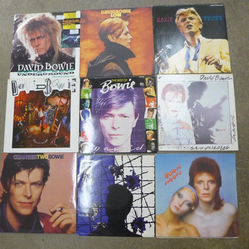 719 - A collection of 12 David Bowie and Rolling Stones LP records and 12