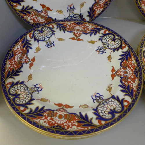 723 - Thirteen Royal Crown Derby Imari pattern 3844 plates, nine x 10