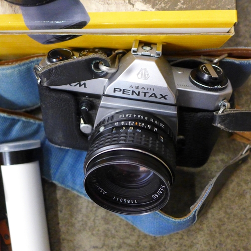 724 - A Pentax KM 35mm camera, Greenkat pocket telescope, folding camera, Bushnell binoculars and tripod