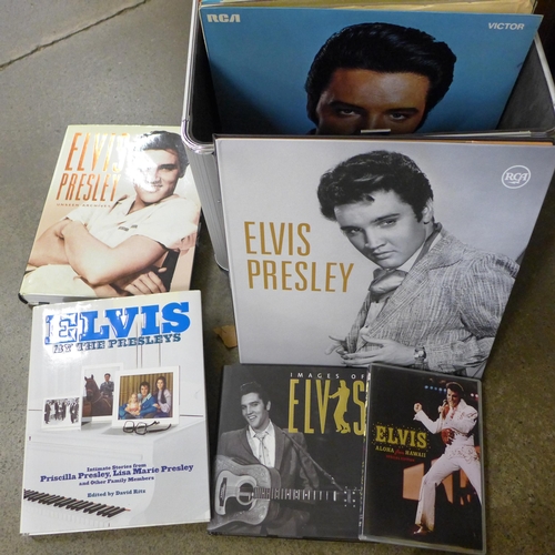 725 - A box of Elvis Presley LP records including re-issues, plus books and a DVD in a Sound Lab record ca... 