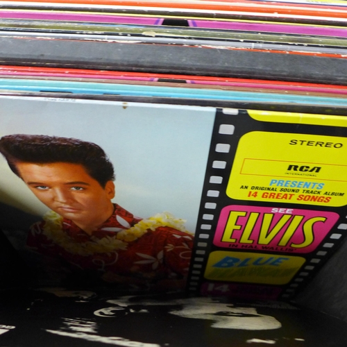 725 - A box of Elvis Presley LP records including re-issues, plus books and a DVD in a Sound Lab record ca... 