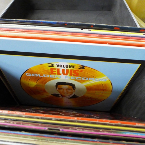 725 - A box of Elvis Presley LP records including re-issues, plus books and a DVD in a Sound Lab record ca... 