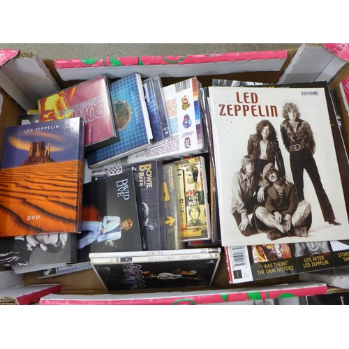 732 - A box of Led Zeppelin, The Who and David Bowie books, CDs and DVDs