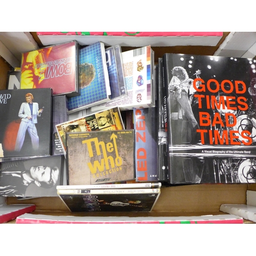 732 - A box of Led Zeppelin, The Who and David Bowie books, CDs and DVDs