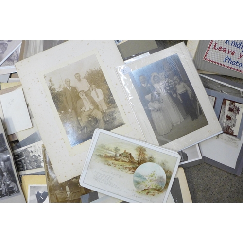 742 - A collection of photographs, postcards and ephemera including one printed on opaque glass