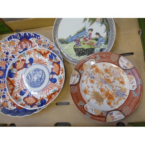 750 - A collection of Japanese Imari pattern chargers and plates and other oriental plates