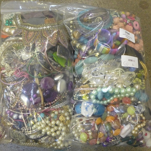 754 - Two bags of costume jewellery