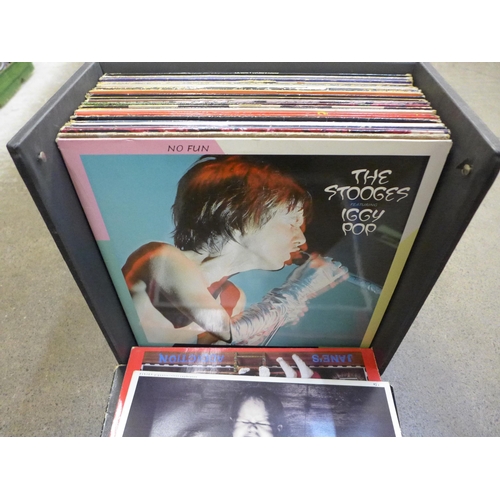 757 - A collection of LP records including The Rolling Stones, Primal Scream, Iggy Pop, Saxon, PiL, Blondi... 