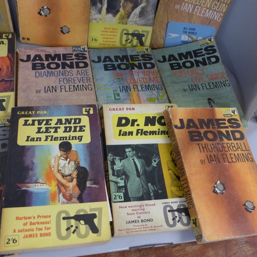 772 - A collection of twenty one James Bond paperback novels by Ian Fleming, published by Pan Books Ltd fr... 