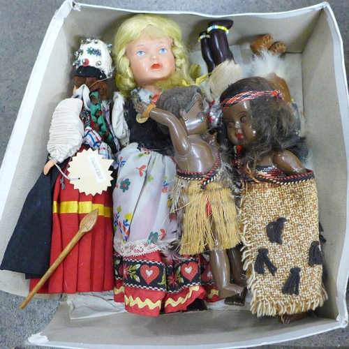 793 - A collection of carvings, dolls of the world and two vintage teddy bears