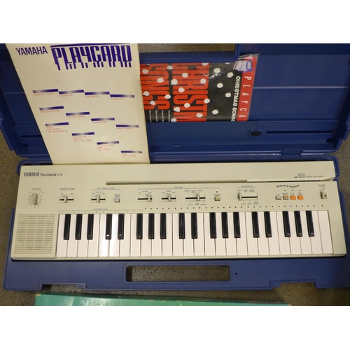 795 - A Yamaha Portasound PC-50 keyboard and a Subbuteo Club Edition game with two extra teams and scorebo... 