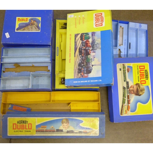796 - Four empty Hornby Dublo train set boxes, one with track