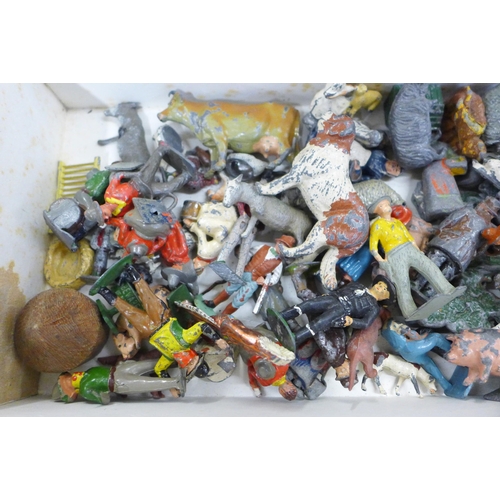 798 - A box of mixed Britains farm animals, native American figures, soldiers, Crescent Toys cooker, etc.