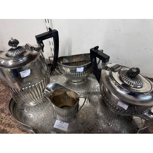 317 - A silver plated four piece tea and coffee service