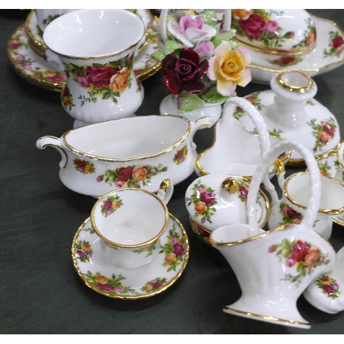 806 - A collection of Royal Albert Old Country Roses china including bowl, flower posies, bell, vase, etc.