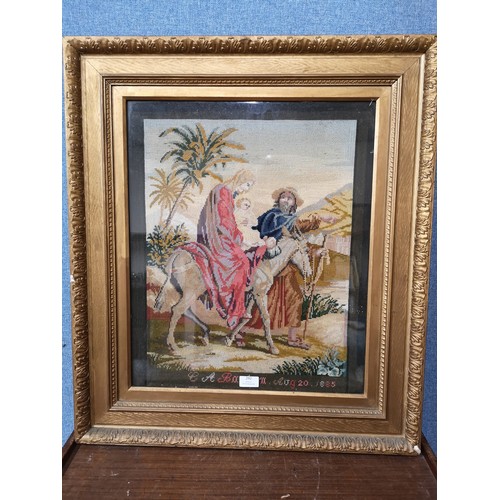 292 - A gilt framed tapestry, dated 1885