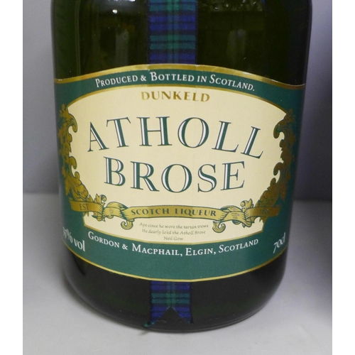 816 - Two bottles; Dunkheld Atholl Brose scotch liquer and a 1997 Bell's The Queen's 50th Wedding Annivers... 