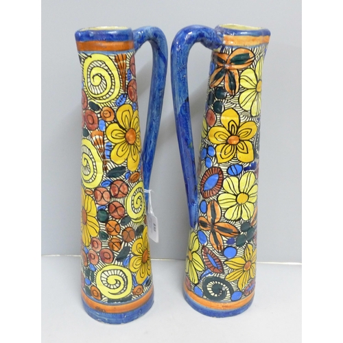 830 - A large pair of Studio vases, hand painted with maker's mark, JH, 37cm