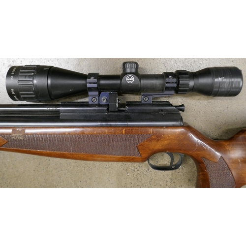 840 - A BSA air rifle with scope and silencer