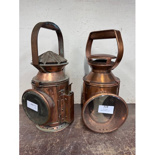 318 - Two railway lamps, one marked Harry Pratt 1945 and with broad arrow and one marked BR