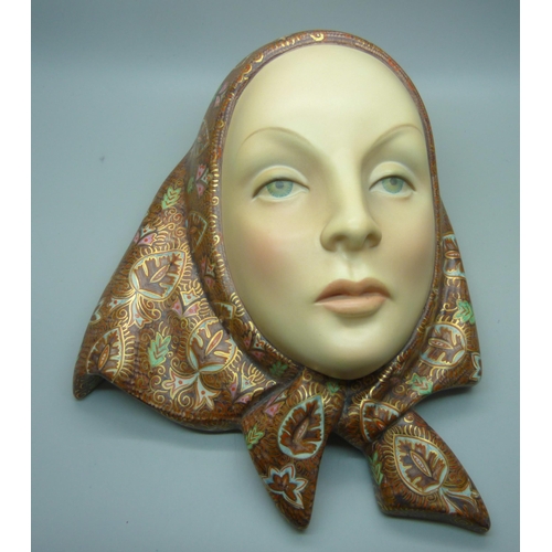 849 - A Lenci Italian face plaque of a young girl wearing a headscarf, 23.5cm wide