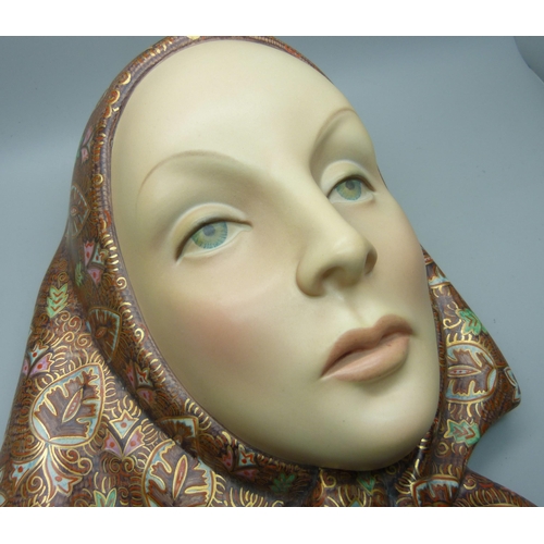 849 - A Lenci Italian face plaque of a young girl wearing a headscarf, 23.5cm wide