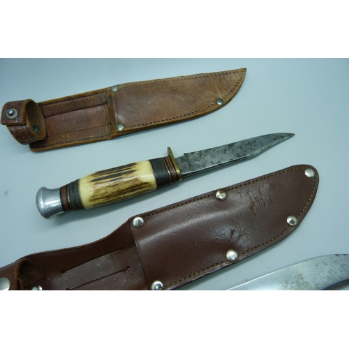 851 - Two knives with antler handles, one with integral tools and one marked Milbro Kampo, made in Sheffie... 