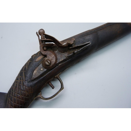 854 - A flintlock overcoat pistol