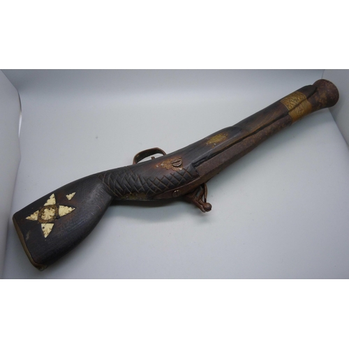 854 - A flintlock overcoat pistol