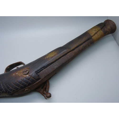 854 - A flintlock overcoat pistol