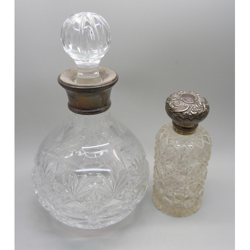 857 - Two silver mounted scent bottles