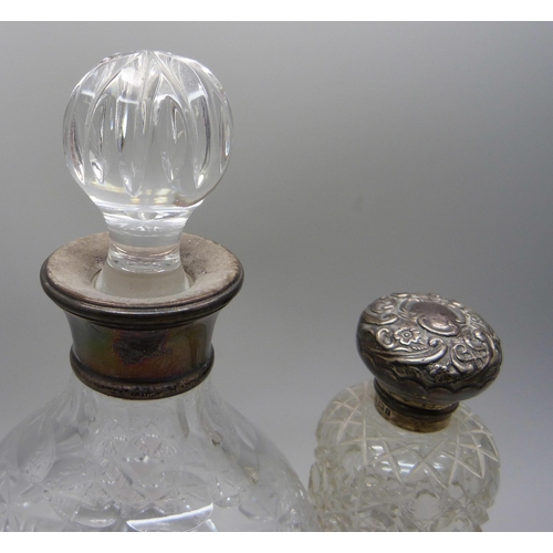 857 - Two silver mounted scent bottles