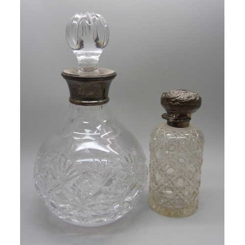 857 - Two silver mounted scent bottles