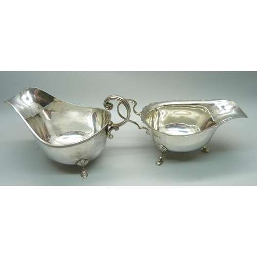 859 - Two silver sauce boats, 86g and 158g, (244g)