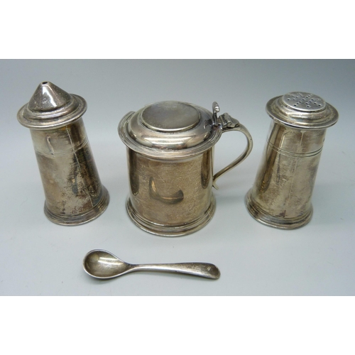 869 - A silver salt, pepper and mustard with mustard spoon, 240g, cased