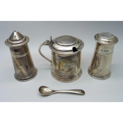 869 - A silver salt, pepper and mustard with mustard spoon, 240g, cased