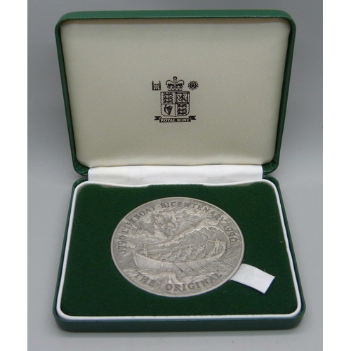 873 - The Royal Mint, a silver commemorative Lifeboat Medallion, cased, 153g