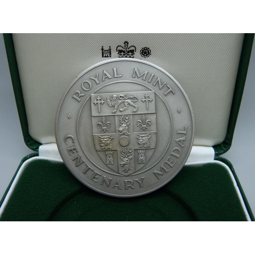 873 - The Royal Mint, a silver commemorative Lifeboat Medallion, cased, 153g