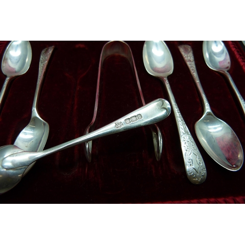 874 - A cased set of six silver spoons and sugar bows, 97g