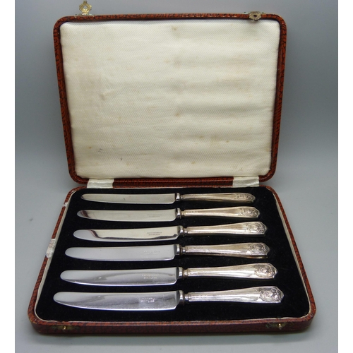 875 - A cased set of six silver handled knives