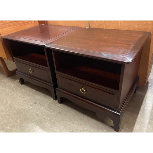 125 - A pair of Stag Minstrel mahogany bedside tables