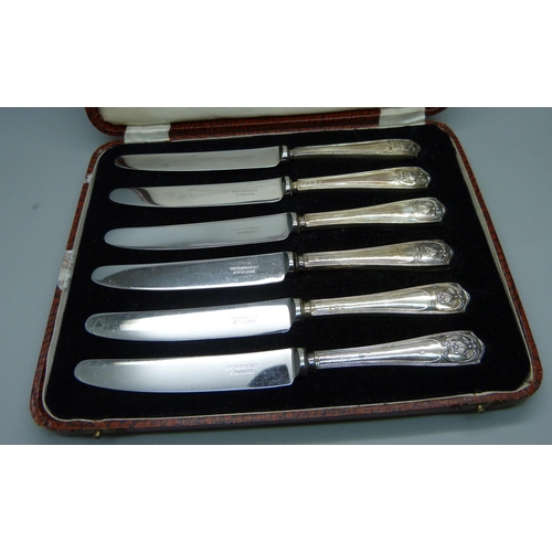 875 - A cased set of six silver handled knives