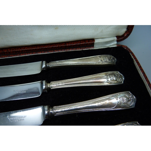 875 - A cased set of six silver handled knives