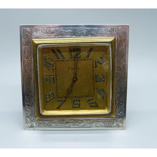 882 - A silver framed travel clock, Birmingham 1927, 72mm